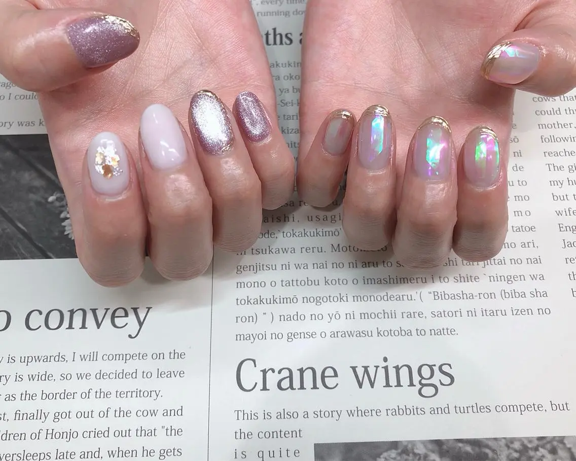 ネイル オーロラネイル マグネットネイル パープル saki_ nail heronのネイルデザイン