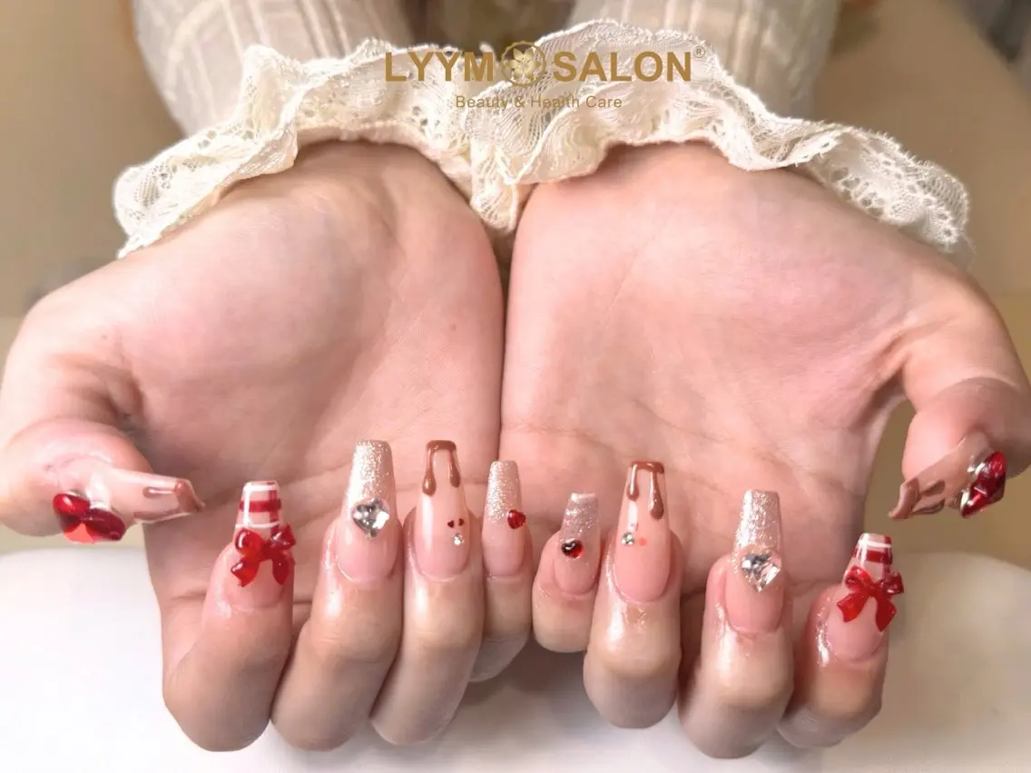 ネイル ガーリー 韓国ネイル リボン バレンタイン ハンドネイル LYYM Salonのネイルデザイン