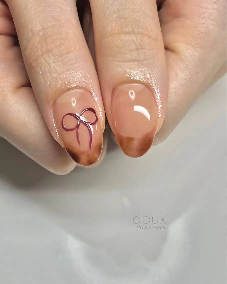 ネイル アニマル柄 アートネイル 韓国ネイル ニュアンスネイル リボン doux. nailのネイルデザイン
