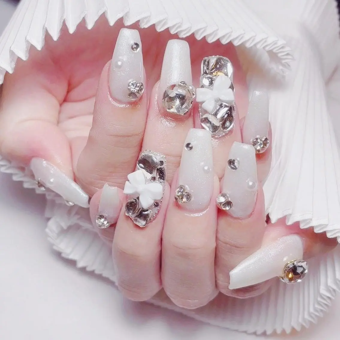 ネイル RAFFINE haru🦋🩵のネイルデザイン