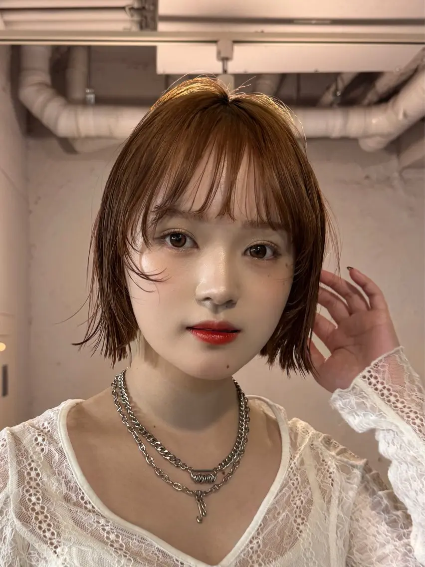 ショート カット ヘアカラー 顔まわりレイヤー 透明感カラー🩵🩵のヘアスタイル