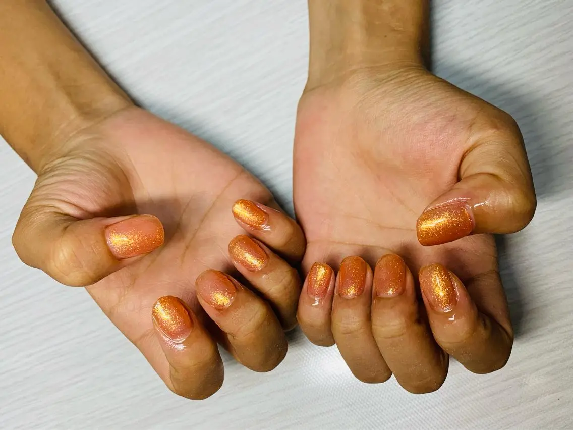 ネイル アートネイル オーロラネイル ジェルネイル キラキラネイル オレンジ Nailsalon Spina 琴美のネイルデザイン