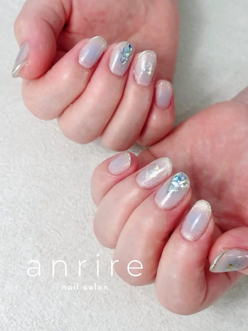 ネイル ブルー チークネイル ジェルネイル キラキラネイル ラメ(グリッター) ハンドネイル nailsalon anrireのネイルデザイン