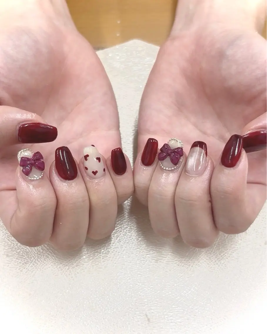 ネイル ボルドー ハート ニュアンスネイル リボン ハンドネイル Mary nail .narumiのネイルデザイン