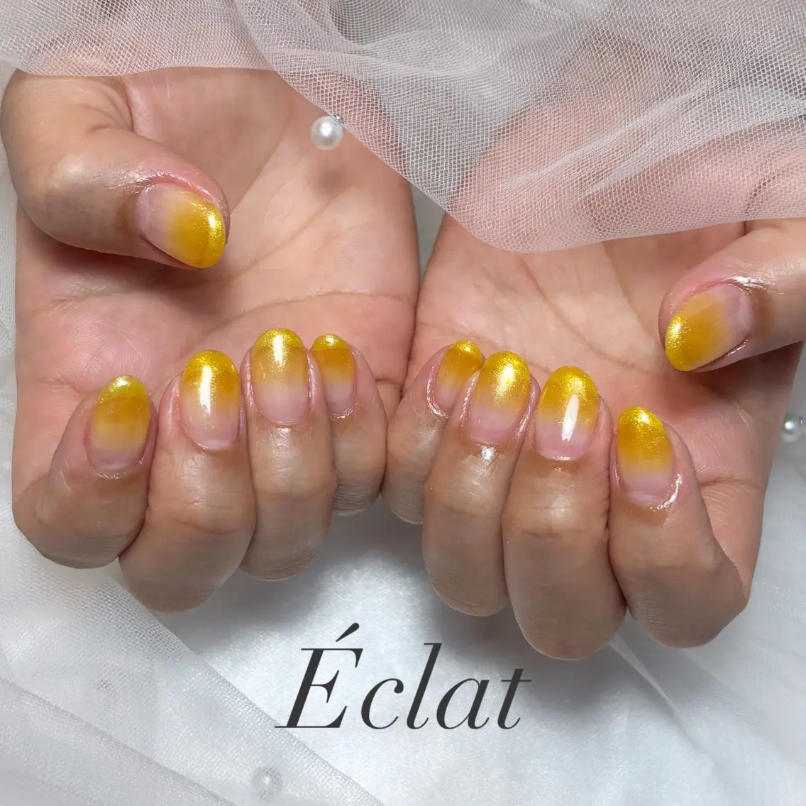 ネイル ラメ(グリッター) ラメグラデーション 黄色 ハンドネイル nail salon Éclatのネイルデザイン