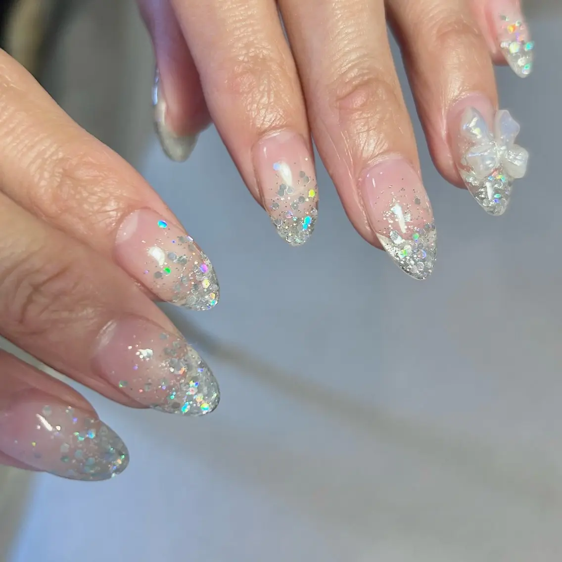 ネイル クリアネイル ハート リボン tenoteno nail/yuuriのネイルデザイン