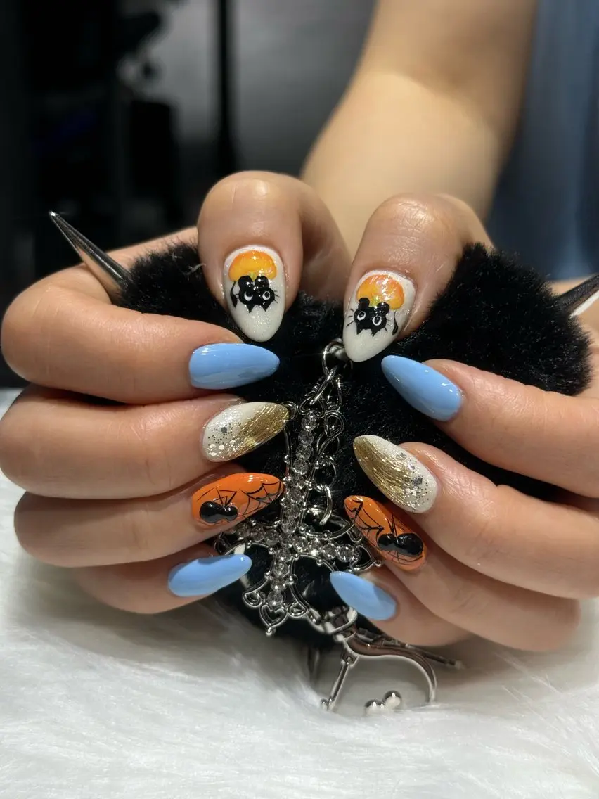 ネイル ハロウィン 水色 持ち込み オレンジ 黄色 ハンドネイル KOTORA NAILのネイルデザイン