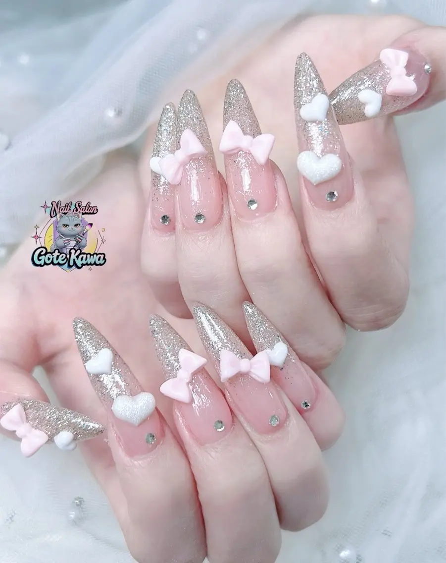 ネイル アートネイル 長さ出し キラキラネイル ピンク リボン ハンドネイル ハンドケア Gote Kawa nail salonのネイルデザイン