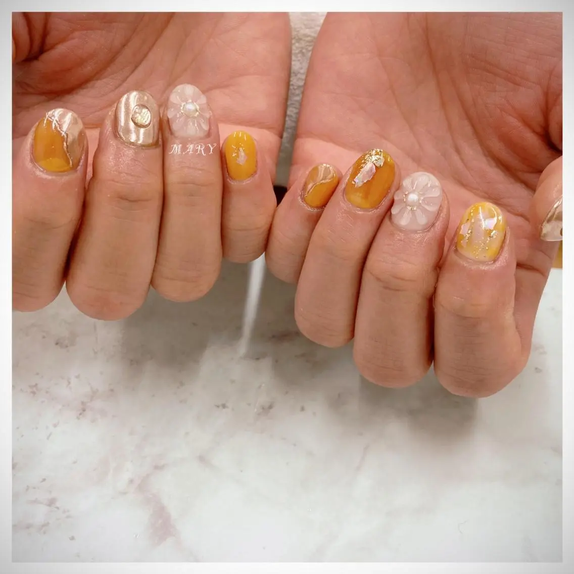 ネイル フラワーネイル ニュアンスネイル オレンジ ハンドネイル Mary nail .narumiのネイルデザイン