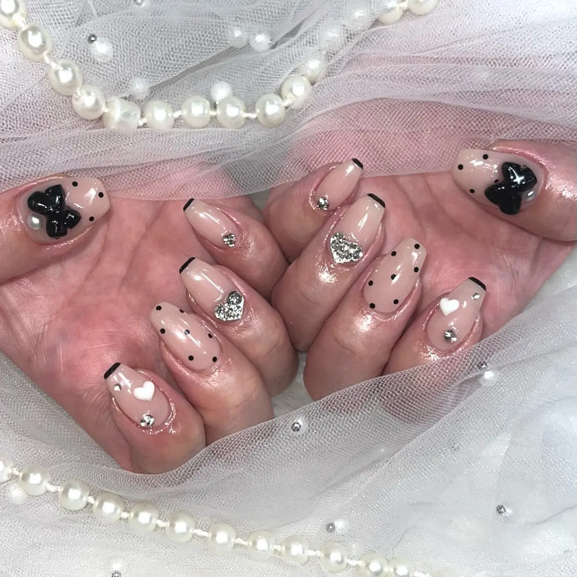 ネイル ドット リボン Zir nail🪽 Otohaのネイルデザイン