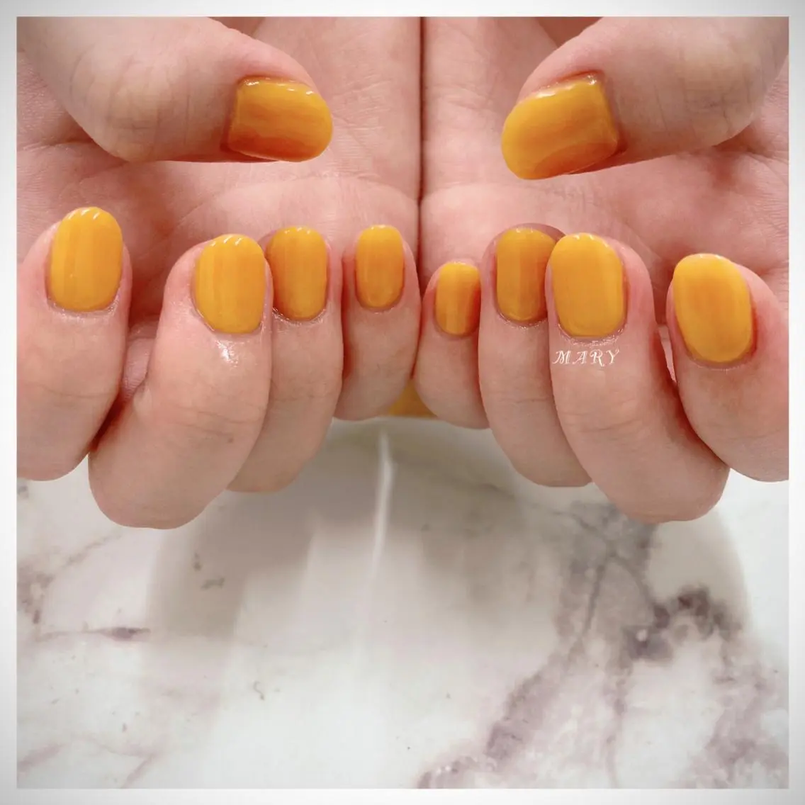 ネイル ニュアンスネイル ワンカラーネイル オレンジ シンプルネイル 黄色 ハンドネイル Mary nail .narumiのネイルデザイン