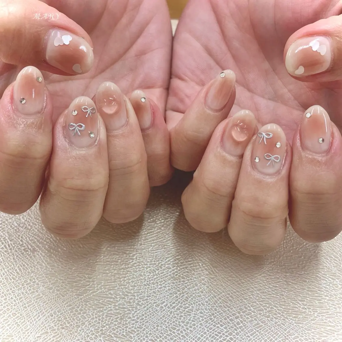ネイル チークネイル ハート ニュアンスネイル ピンク リボン ハンドネイル Mary nail .narumiのネイルデザイン