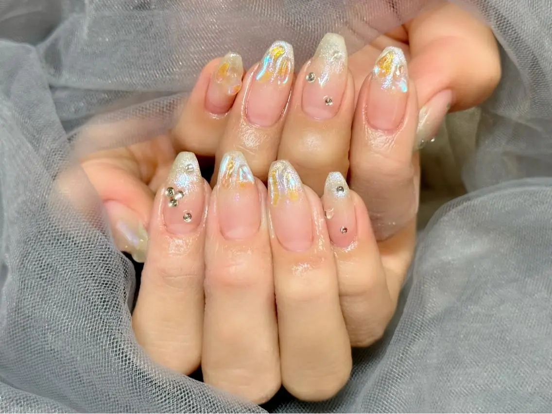 ネイル オーロラネイル マグネットネイル 黄色 ハンドネイル Nail Salon KURELLYのネイルデザイン