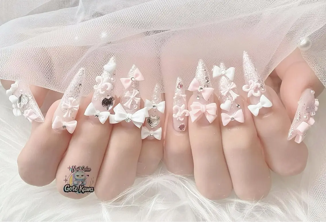 ネイル グラデーション キラキラネイル リボン 春ネイル バレンタイン ハンドネイル ハンドケア Gote Kawa nail salonのネイルデザイン
