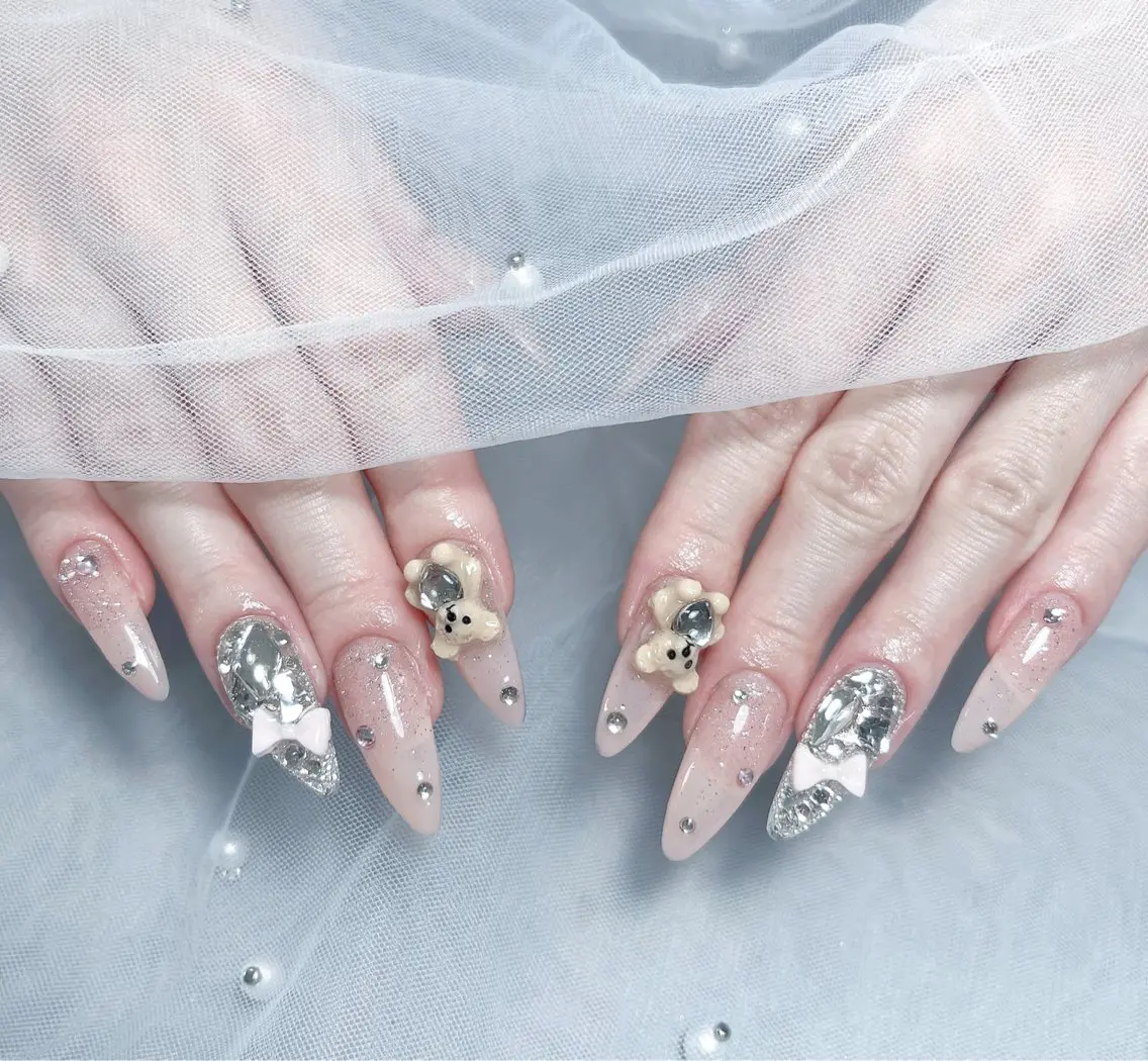 ネイル 成人式 ロングネイル マグネットネイル 大理石ネイル(マーブル) リボン ハンドネイル Amee Nail Salonのネイルデザイン