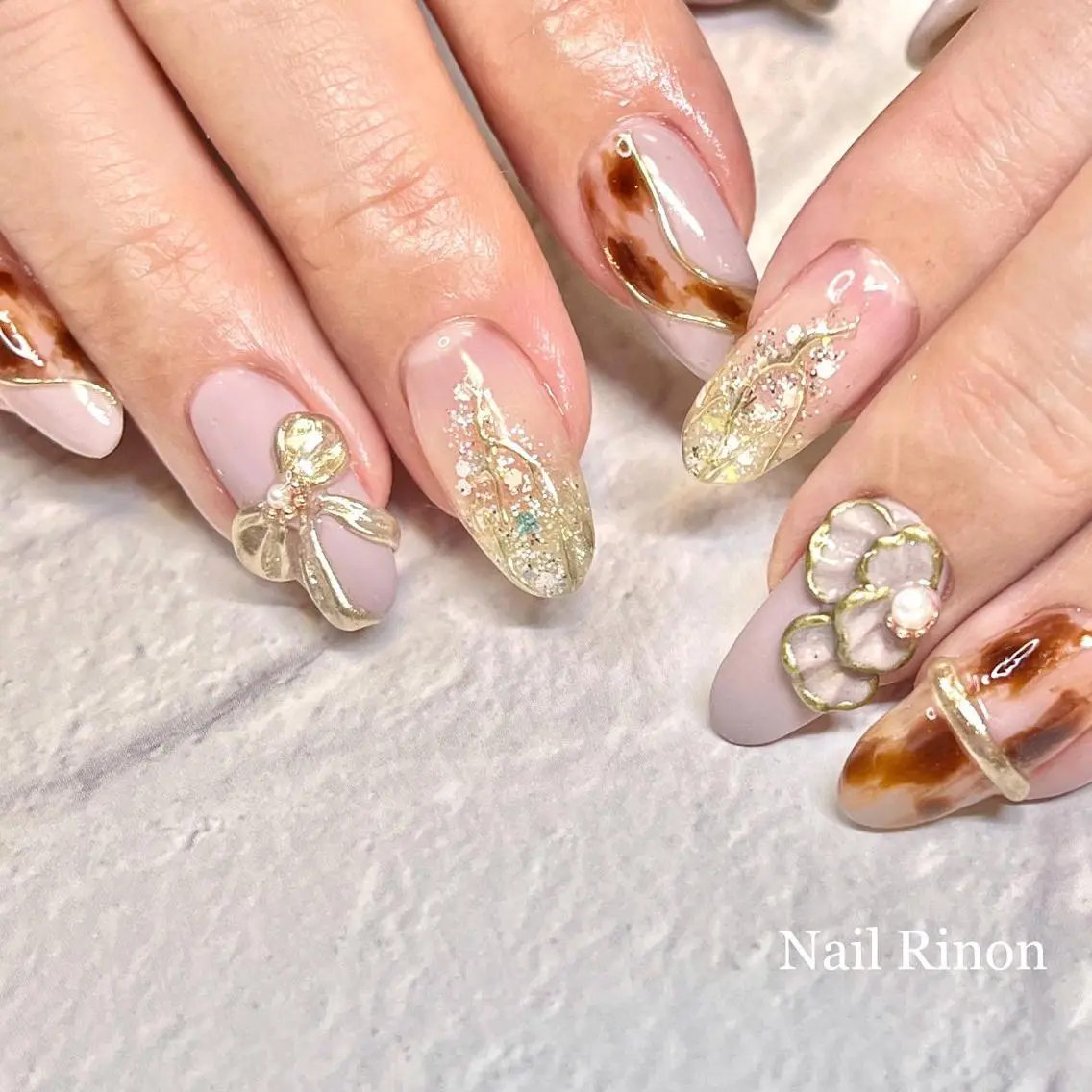 ネイル アニマル柄 フラワーネイル 持ち込み リボン ハンドネイル Nail Rinonのネイルデザイン
