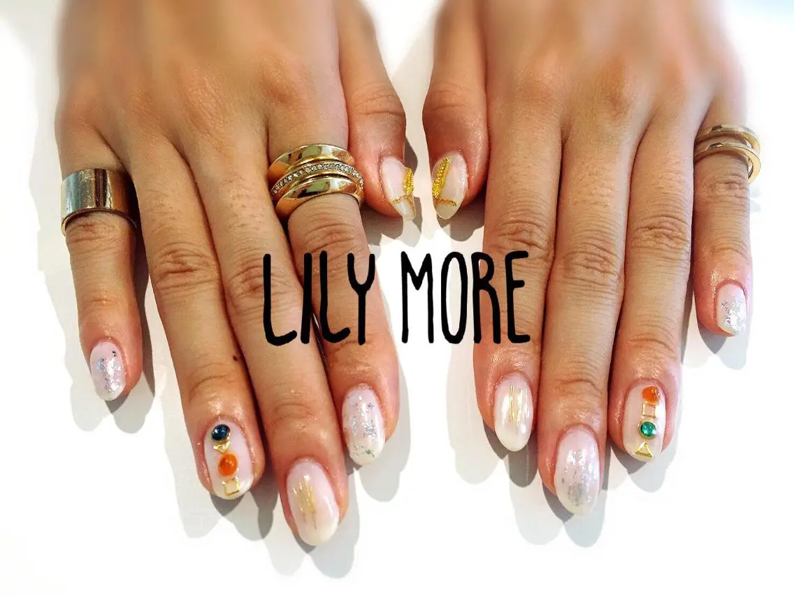 ネイル ジェルネイル オレンジ ストーンネイル Lily closetのネイルデザイン