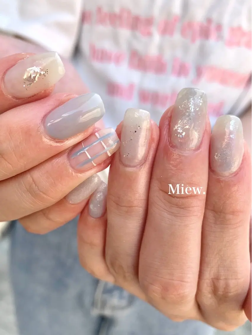 ネイル 水色 ホワイト Mina🫧 【Miew.】のネイルデザイン