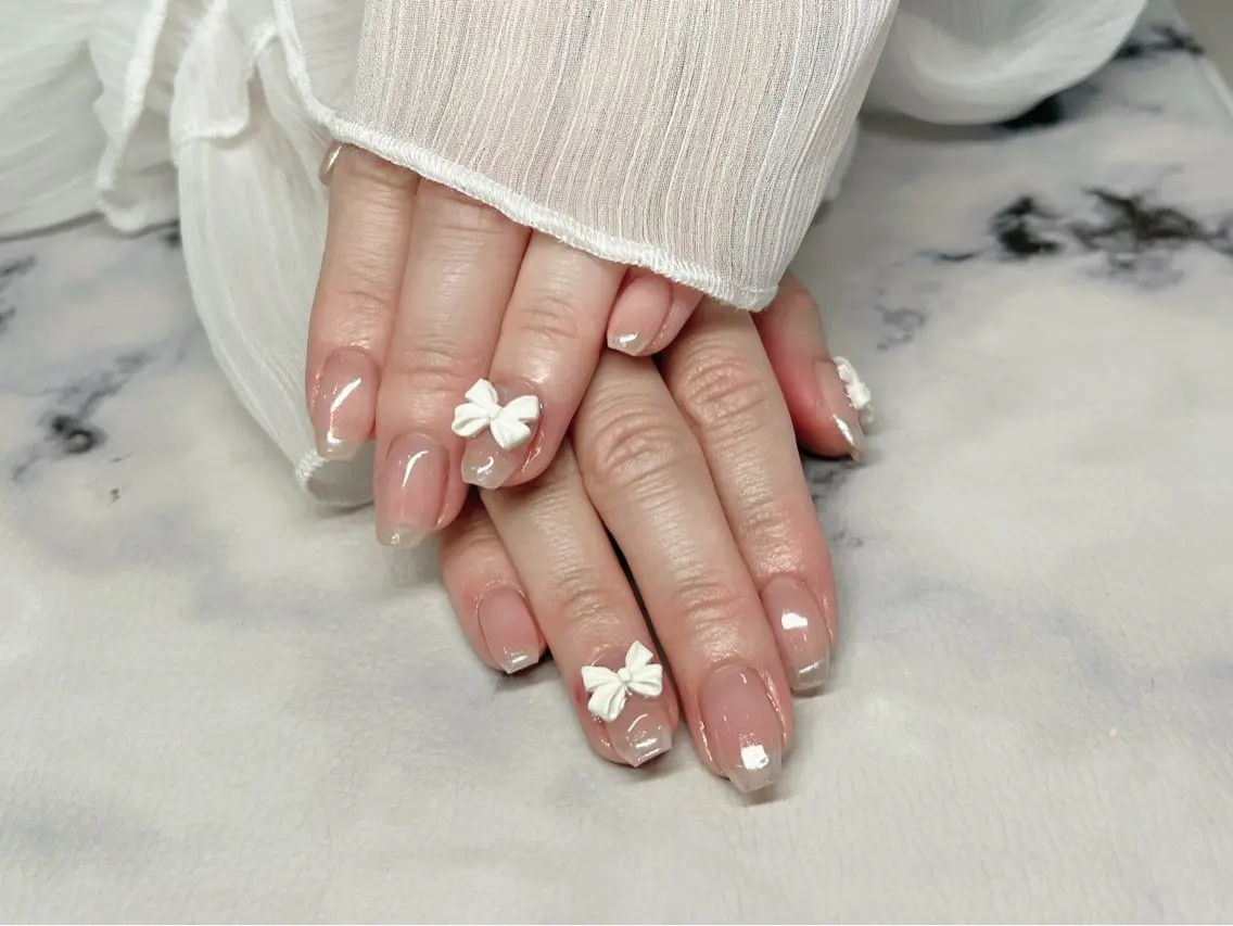 ネイル フレンチネイル リボン ホワイト ハンドネイル M's Nailのネイルデザイン