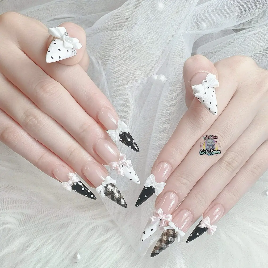ネイル ドット ガーリー リボン ツイードネイル Gote Kawa nail salonのネイルデザイン