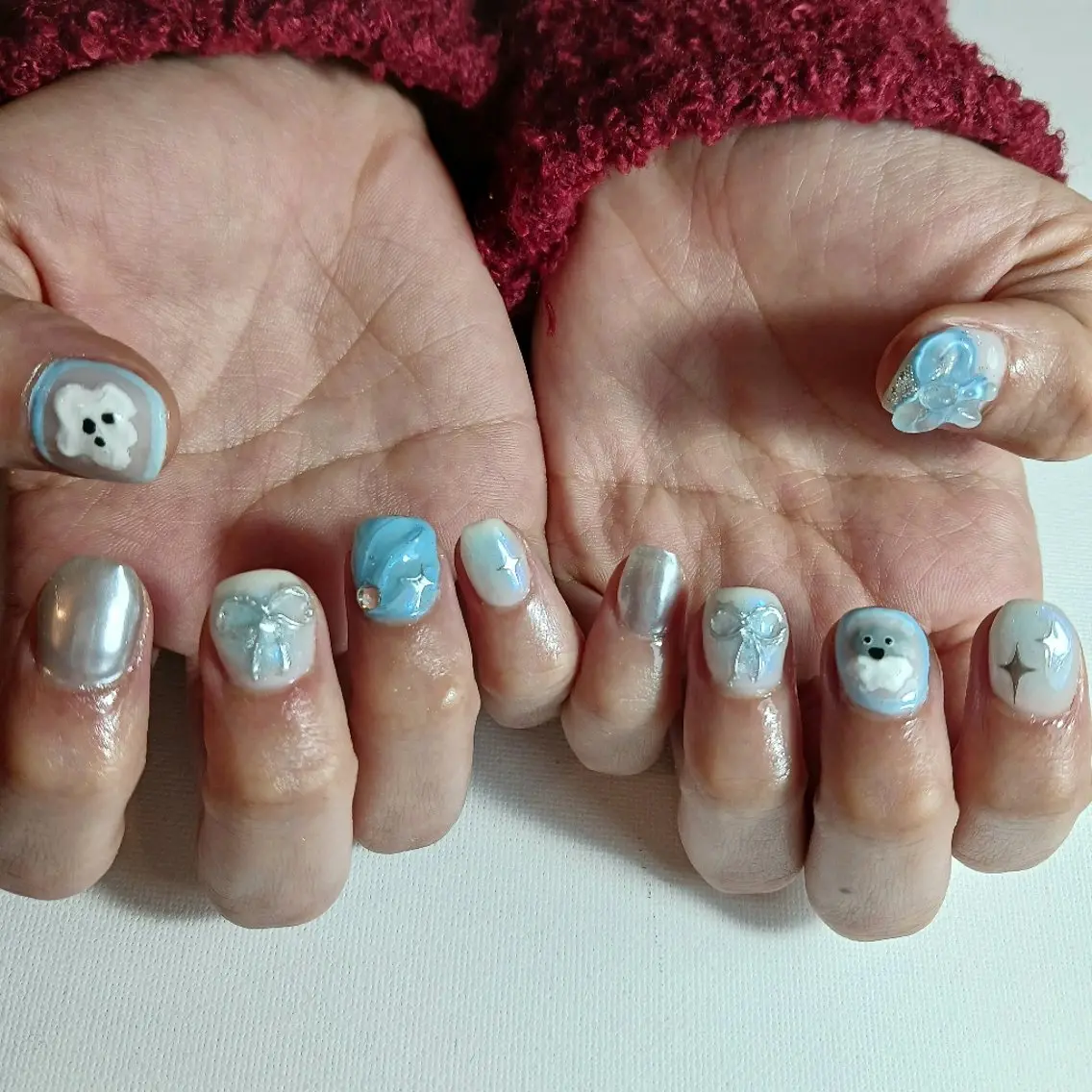 ネイル ジェルネイル 水色 ミラーネイル 持ち込み リボン ハンドネイル owlnail /持込みデザイン専門のネイルデザイン