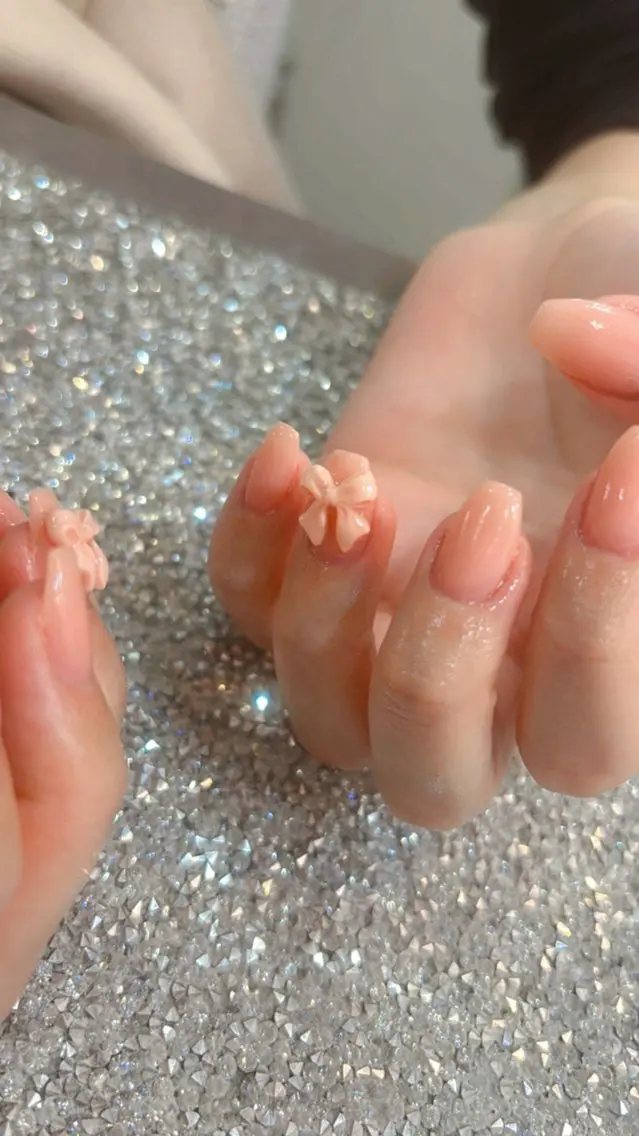 ネイル ワンカラーネイル リボン ハンドネイル 鶴橋wooone nail.rieのネイルデザイン