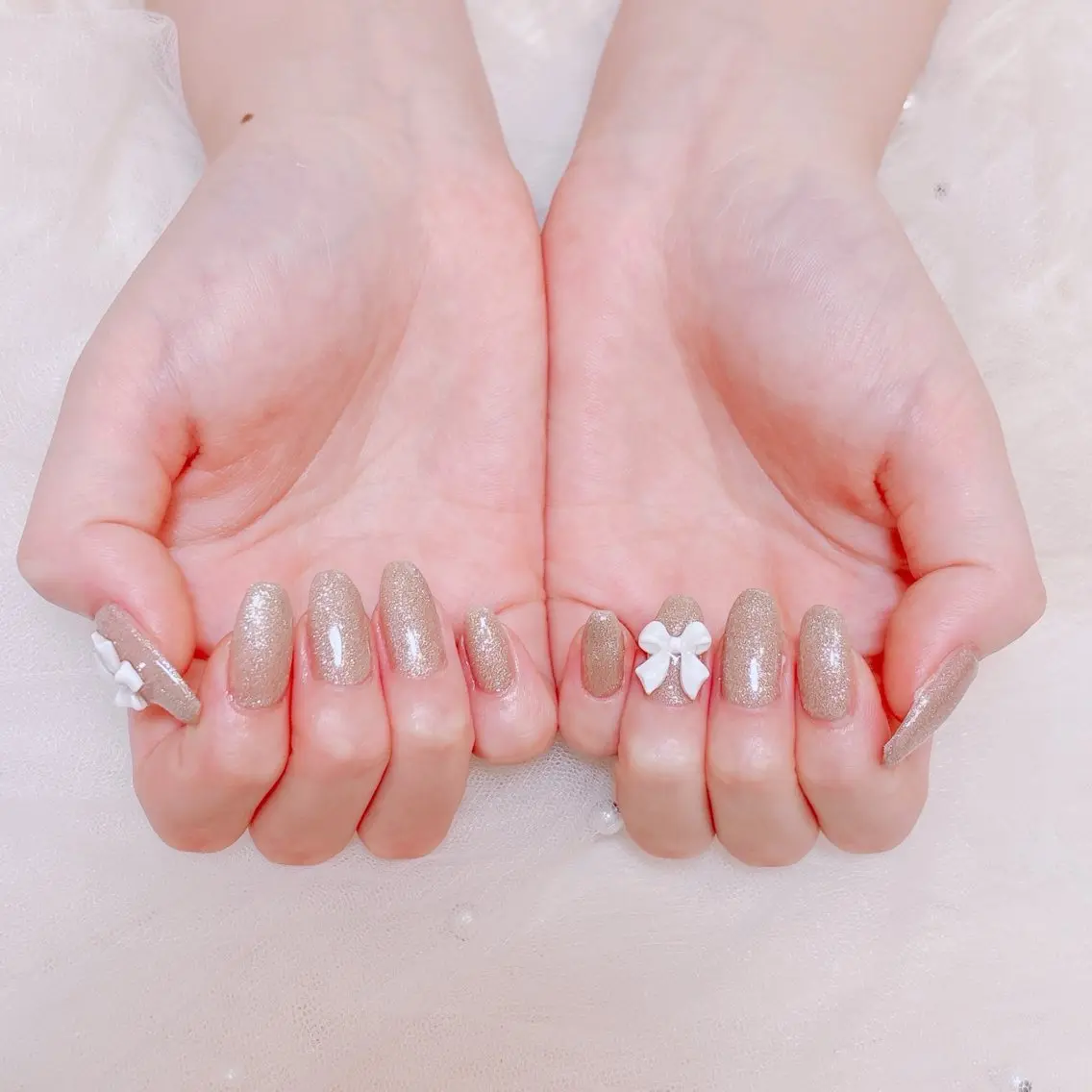 ネイル ワンカラーネイル リボン Bloom Nail Salonのネイルデザイン