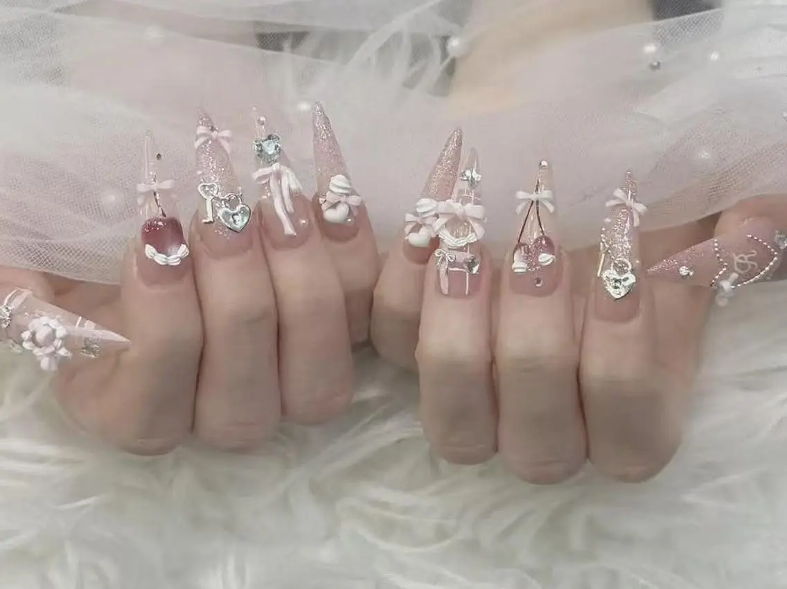 ネイル 韓国ネイル ロングネイル 持ち込み リボン ネイルチップ ハンドネイル フットネイル ハンドケア k.bi nailsalonのネイルデザイン