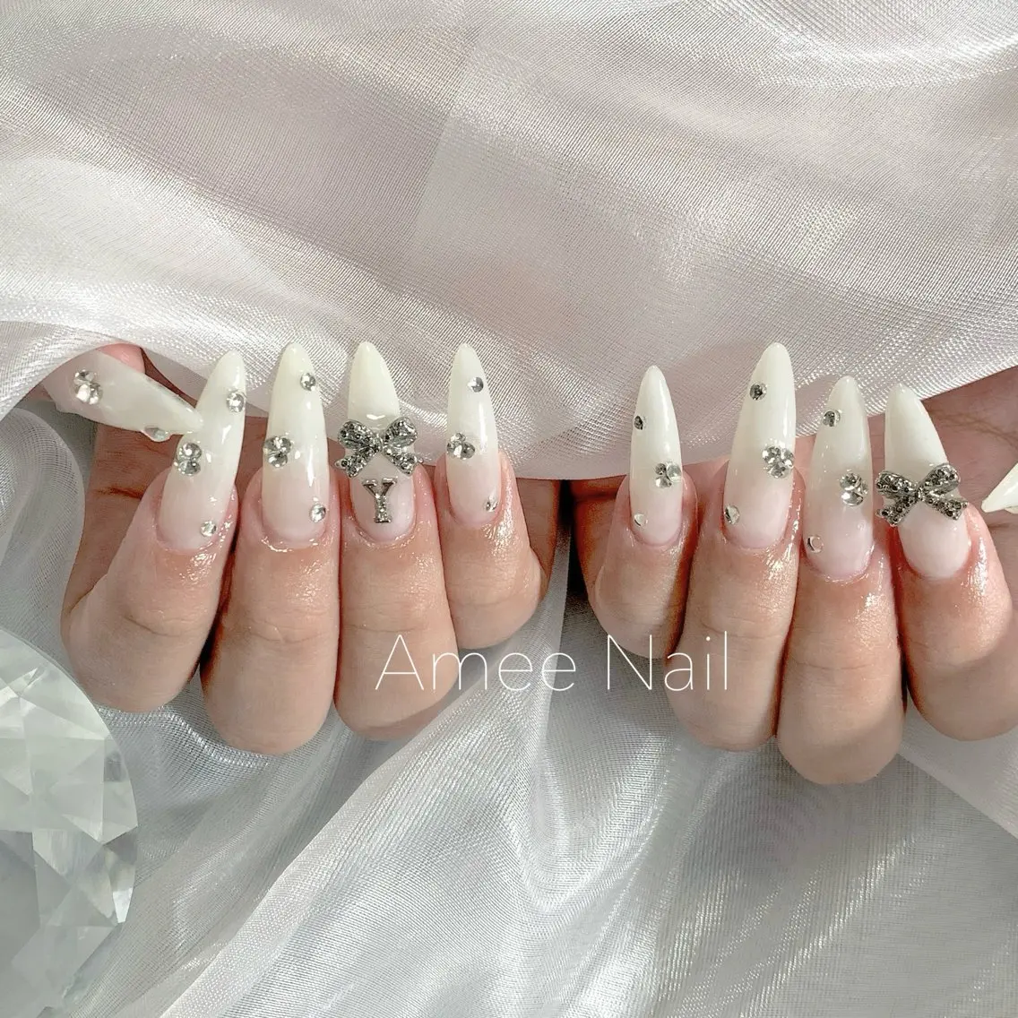 ネイル 成人式 ロングネイル マグネットネイル 大理石ネイル(マーブル) リボン ハンドネイル Amee Nail Salonのネイルデザイン