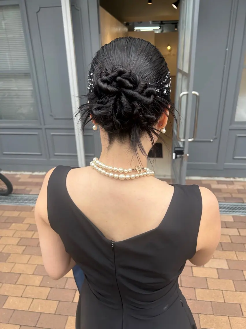 ロング ヘアアレンジ 堤 麻衣子のヘアスタイル