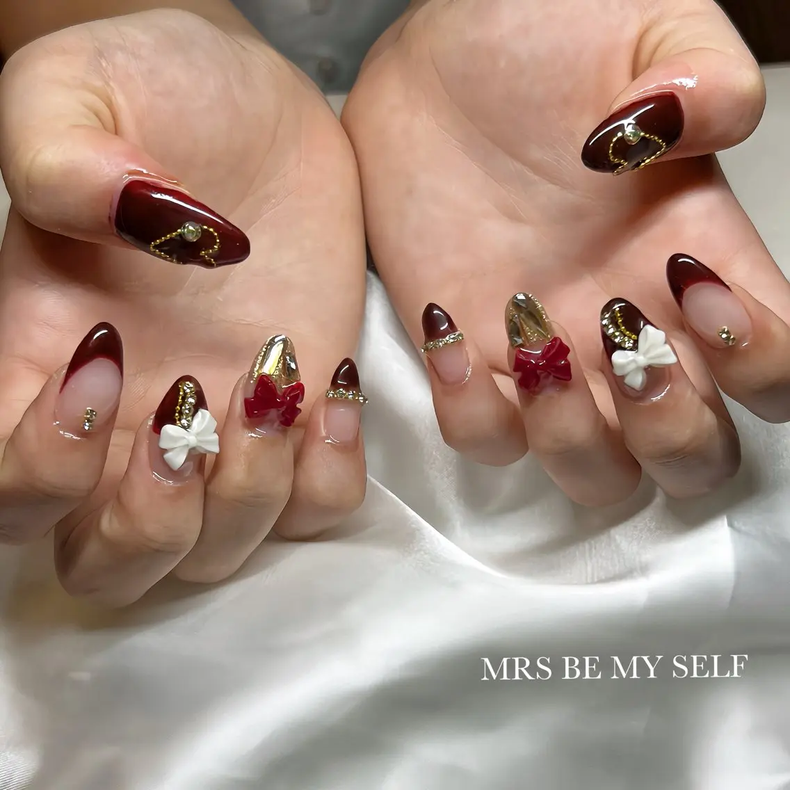ネイル ボルドー ゴールド ハート リボン MRS/ miyu🎀のネイルデザイン