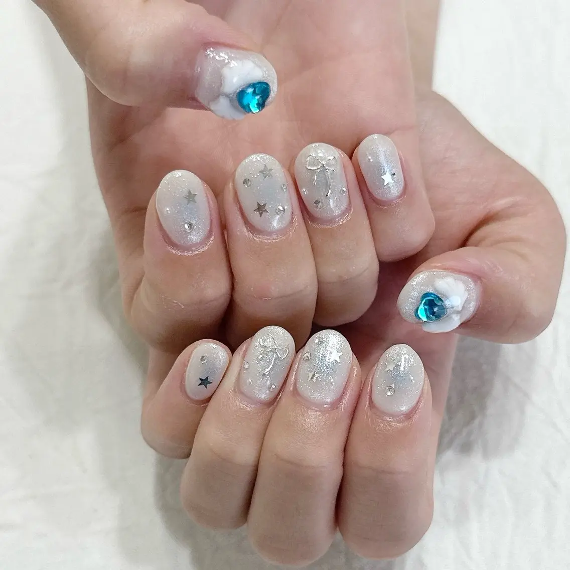 ネイル チークネイル ハート ラメ(グリッター) 水色 ピンク ハンドネイル peaberry nailのネイルデザイン