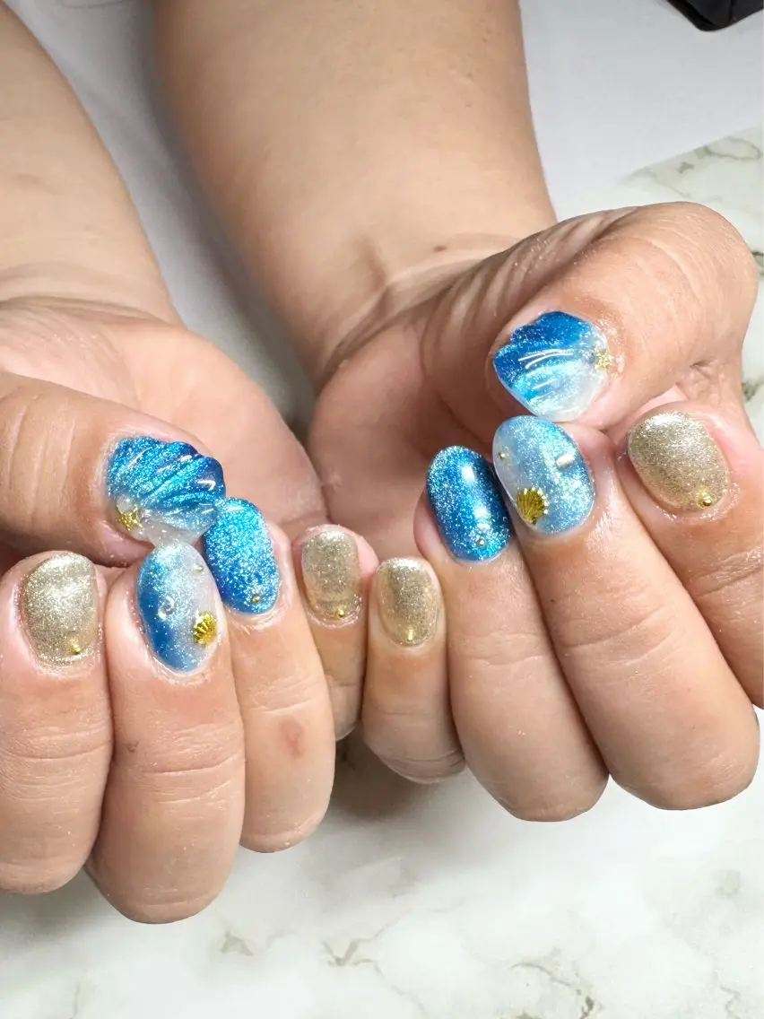 夏☀️シェルネイルorマーメイドネイル🧜‍♀️🐚🩵の写真