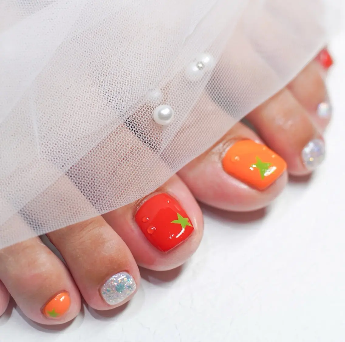 ミディアム フットネイル Re nailのネイルデザイン