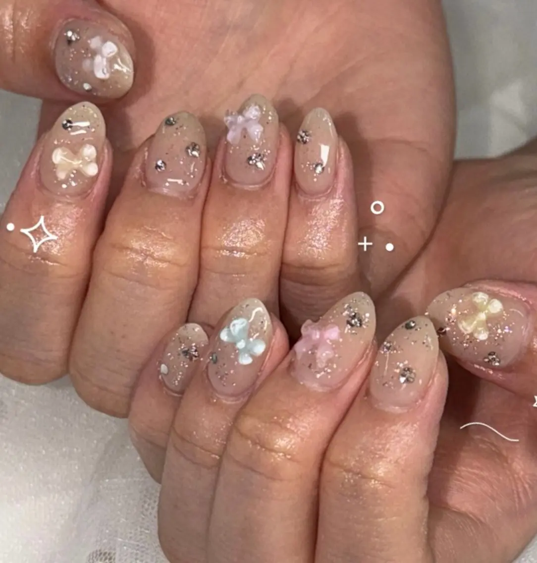 ネイル リボン ハンドネイル WOLTOKYO渋谷 yunaのネイルデザイン