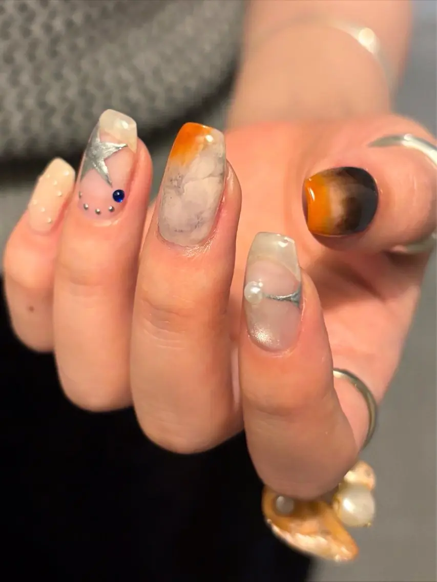 ネイル オレンジ ハンドネイル chika ／ nailのネイルデザイン