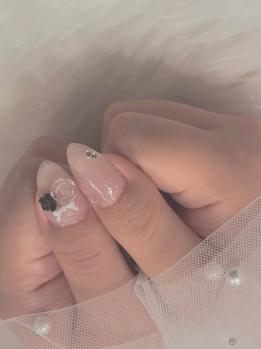 ネイル マグネットネイル リボン ハンドネイル M🎀 nailのネイルデザイン