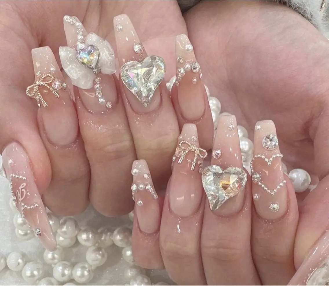 ネイル 成人式 ロングネイル マグネットネイル 大理石ネイル(マーブル) リボン ハンドネイル Amee Nail Salonのネイルデザイン