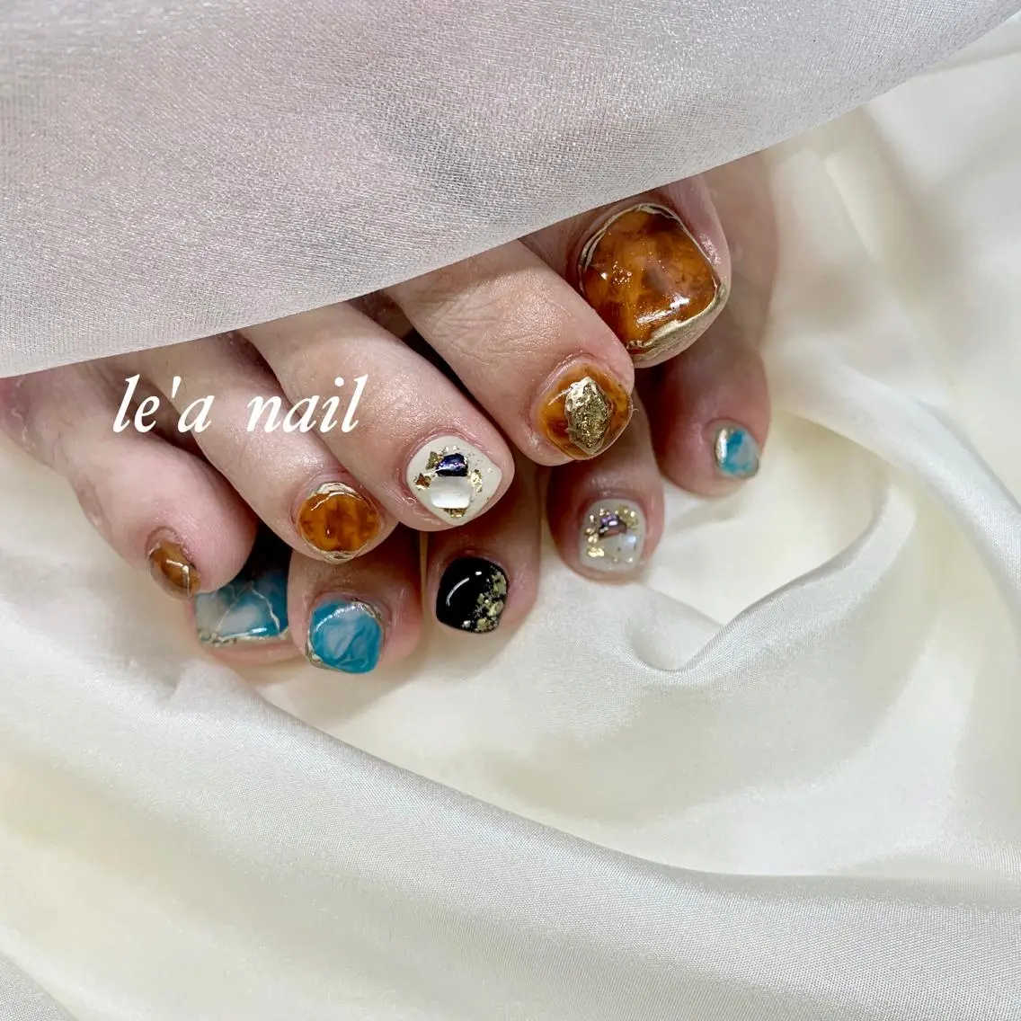ネイル べっ甲ネイル フットネイル 大理石ネイル(マーブル) new me"のネイルデザイン