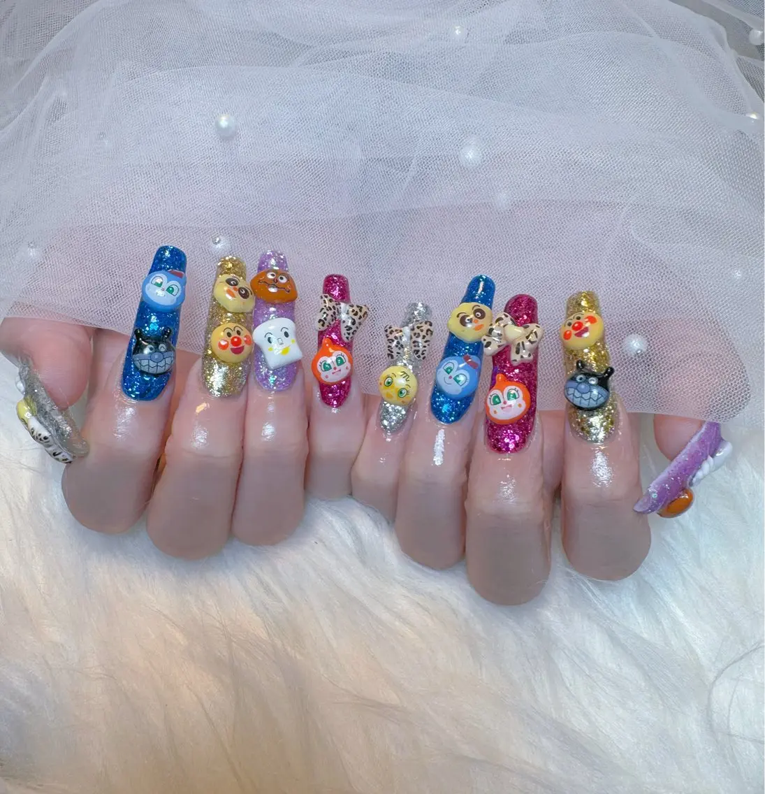 ネイル ブルー キラキラネイル ラメ(グリッター) ロングネイル リボン ハンドネイル Nail Salon K&Rのネイルデザイン