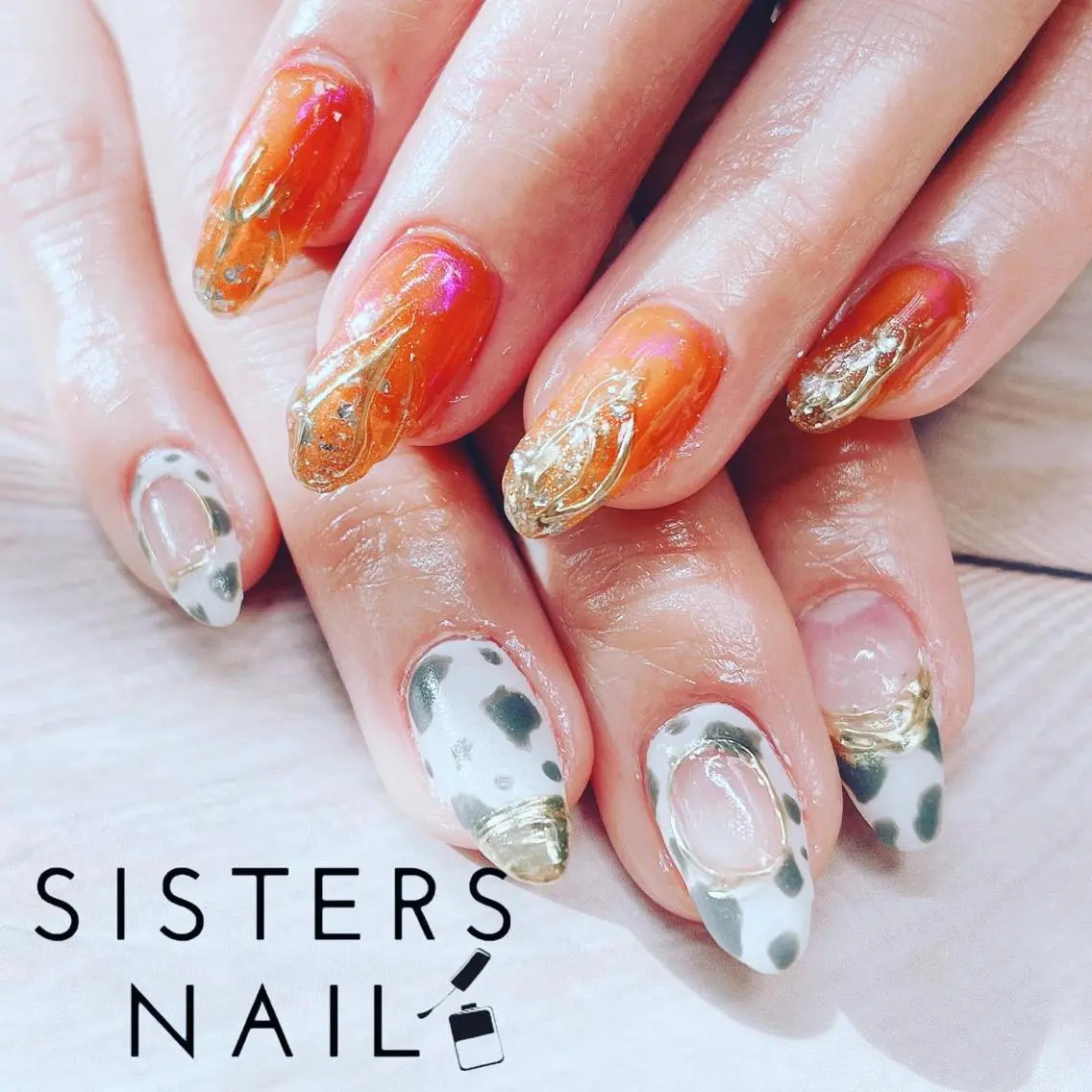 ネイル アートネイル ミラーネイル ニュアンスネイル オレンジ 春ネイル ハンドネイル ハンドケア sisters nail.fのネイルデザイン
