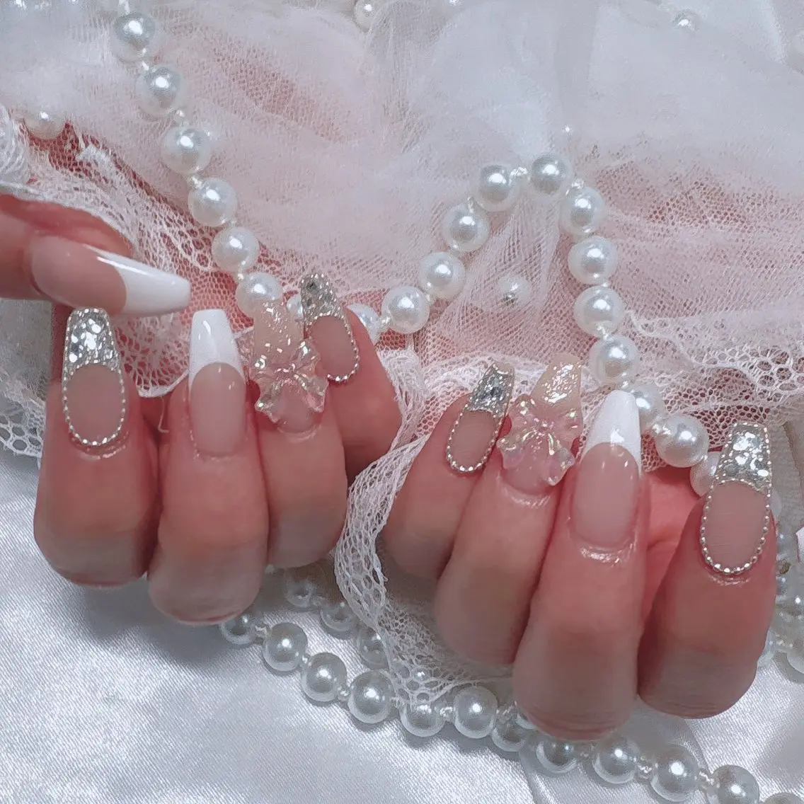 ネイル フレンチネイル ガーリー キラキラネイル ピンク リボン Marinnail Hibikiのネイルデザイン