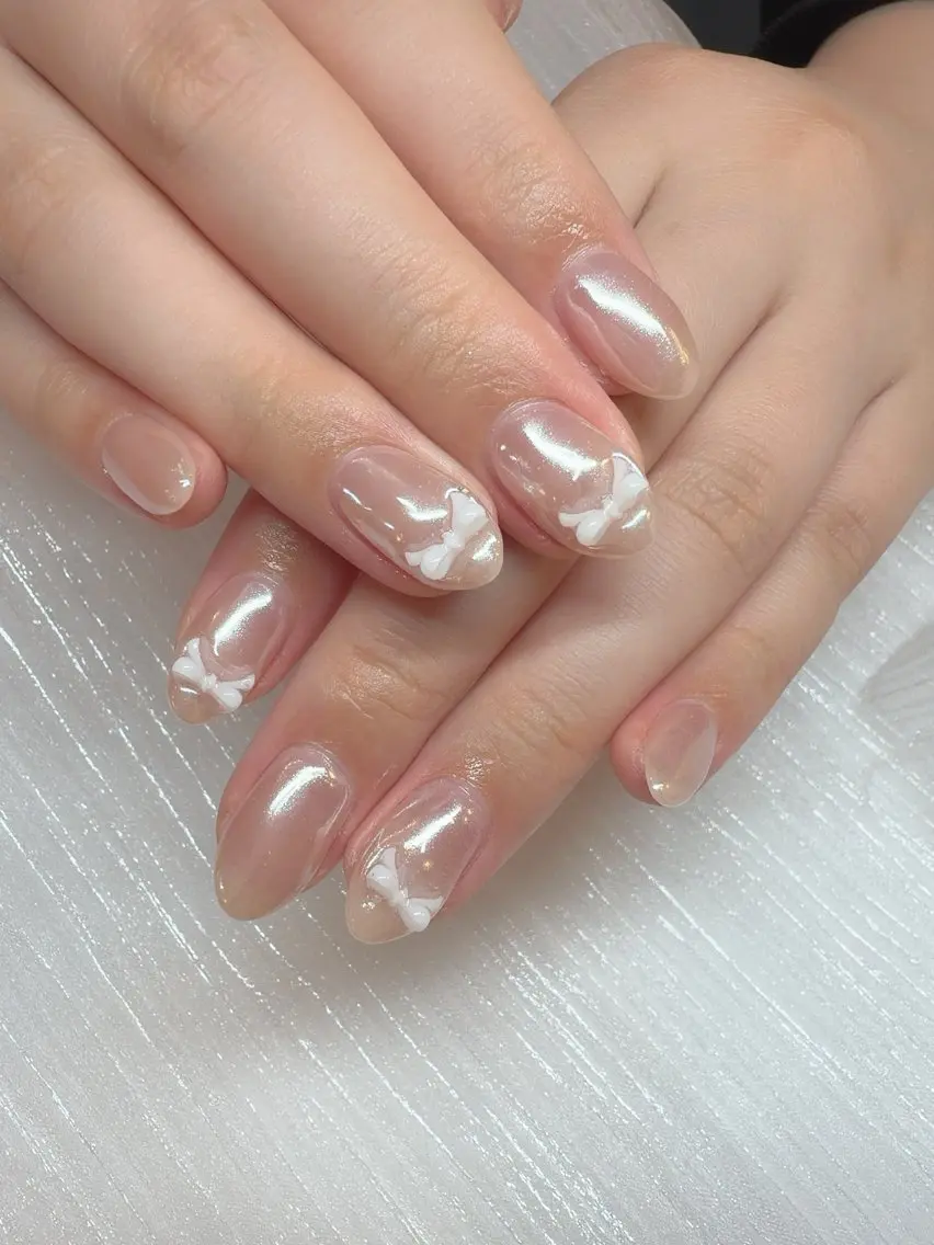 ネイル ミラーネイル ワンカラーネイル リボン ホワイト ハンドネイル teddybear nailsのネイルデザイン