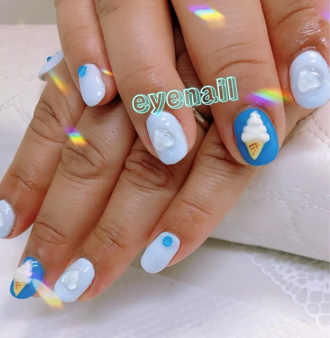 ネイル アートネイル ブルー ハート ストーンネイル Eye nailのネイルデザイン