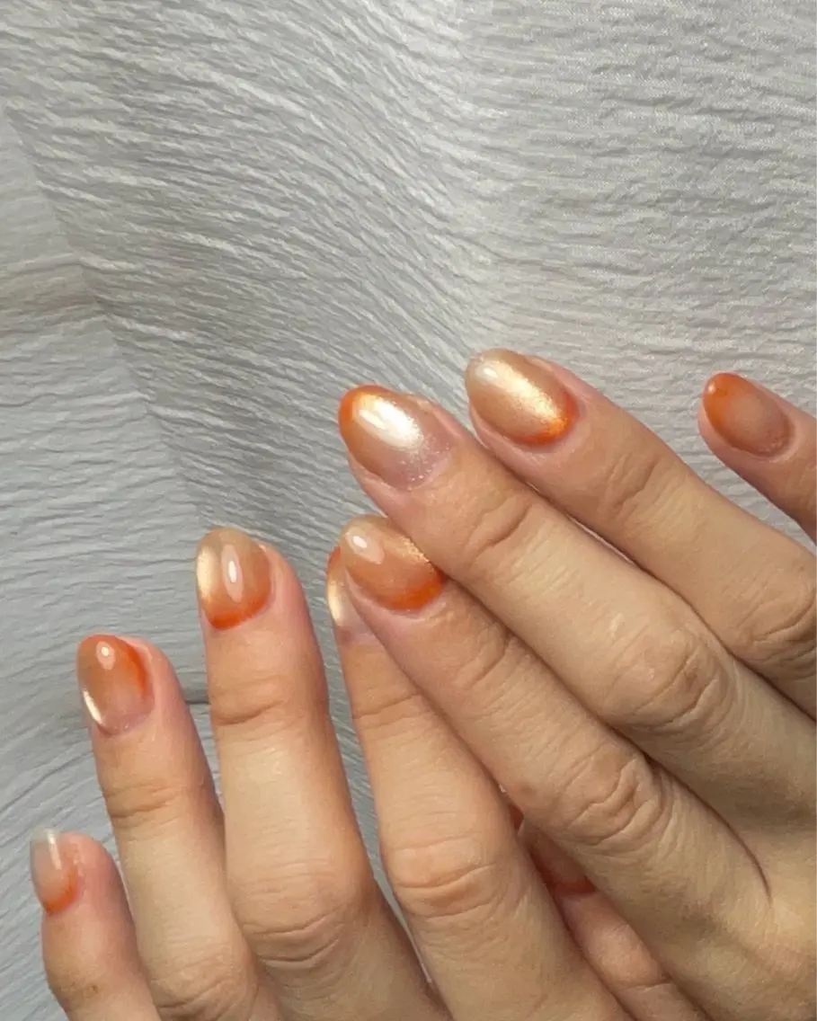 ネイル マグネットネイル オレンジ ハンドネイル muca. nailのネイルデザイン