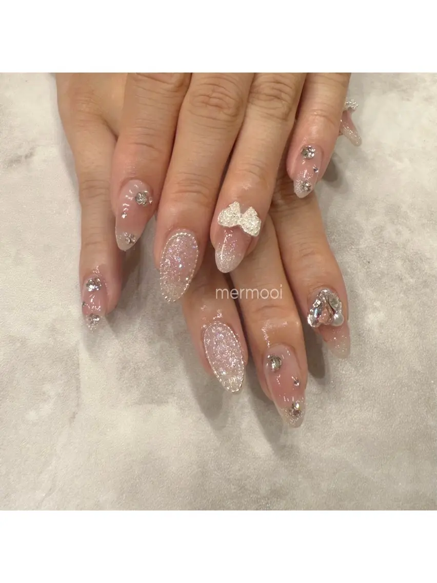 ネイル キラキラネイル 韓国ネイル ラメ(グリッター) ロングネイル リボン melumooi nailのネイルデザイン