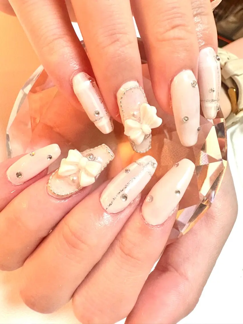 ネイル ラメ(グリッター) ピンク リボン シンプルネイル ストーンネイル 新宿マグネット Mii Nailのネイルデザイン