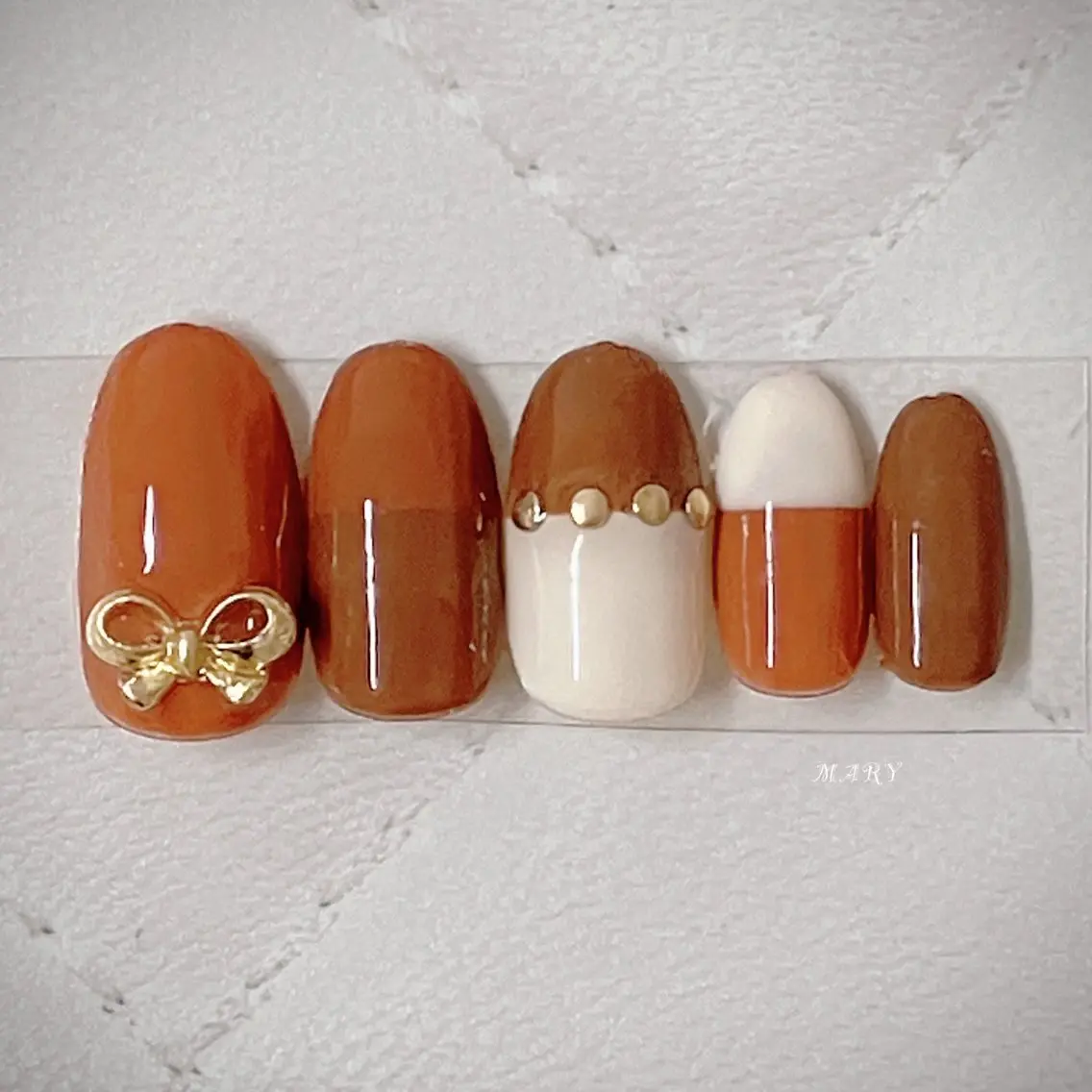 ネイル ブラウン フレンチネイル ニュアンスネイル ワンカラーネイル リボン ハンドネイル Mary nail .narumiのネイルデザイン