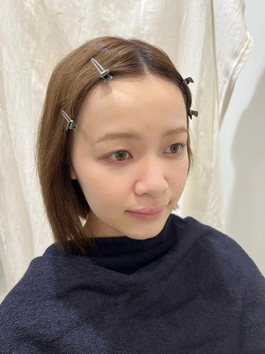 メイク過程の撮影の写真