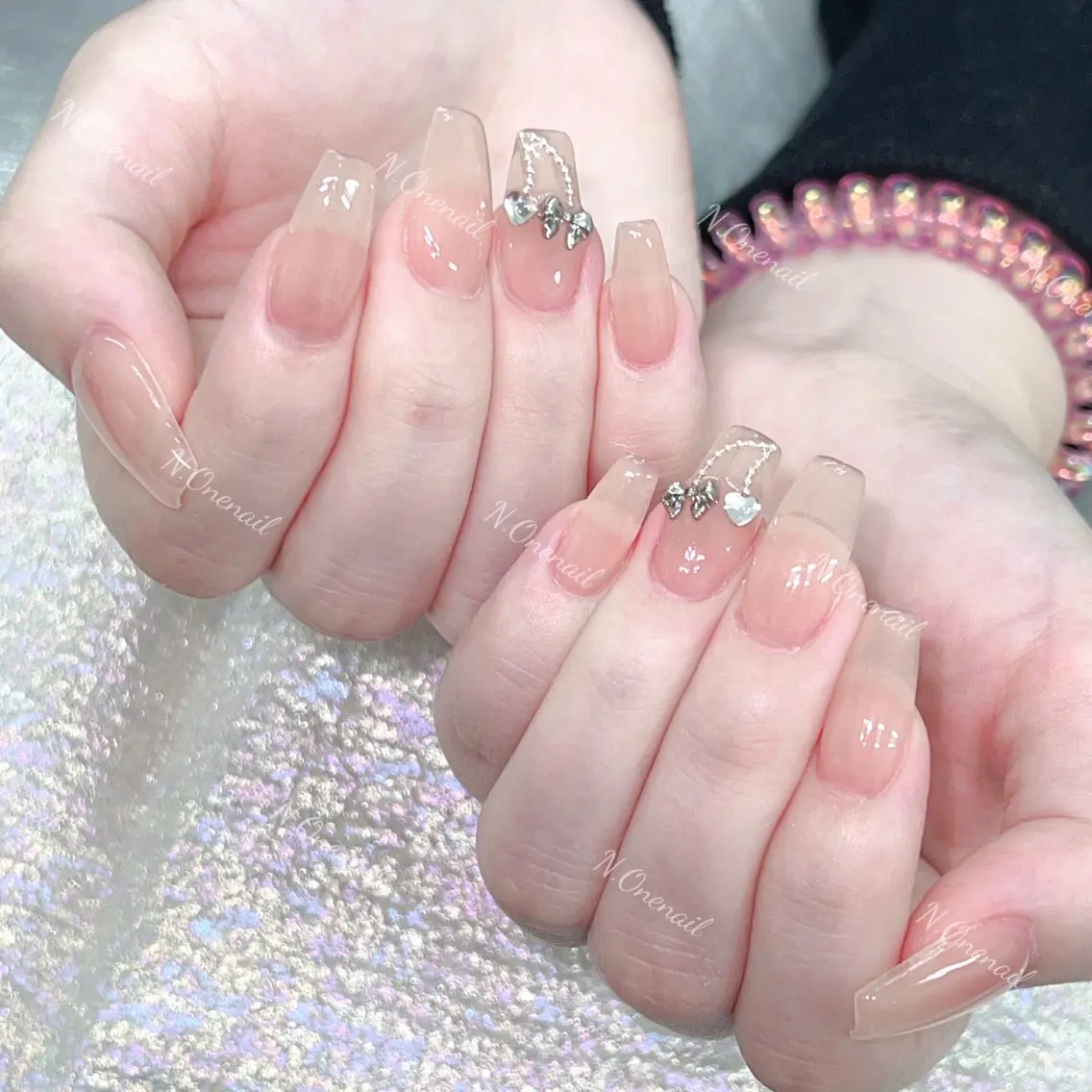 ネイル キラキラネイル 持ち込み ピンク リボン シンプルネイル 長いだし/スカルプ/ パラシェルN.oneのネイルデザイン